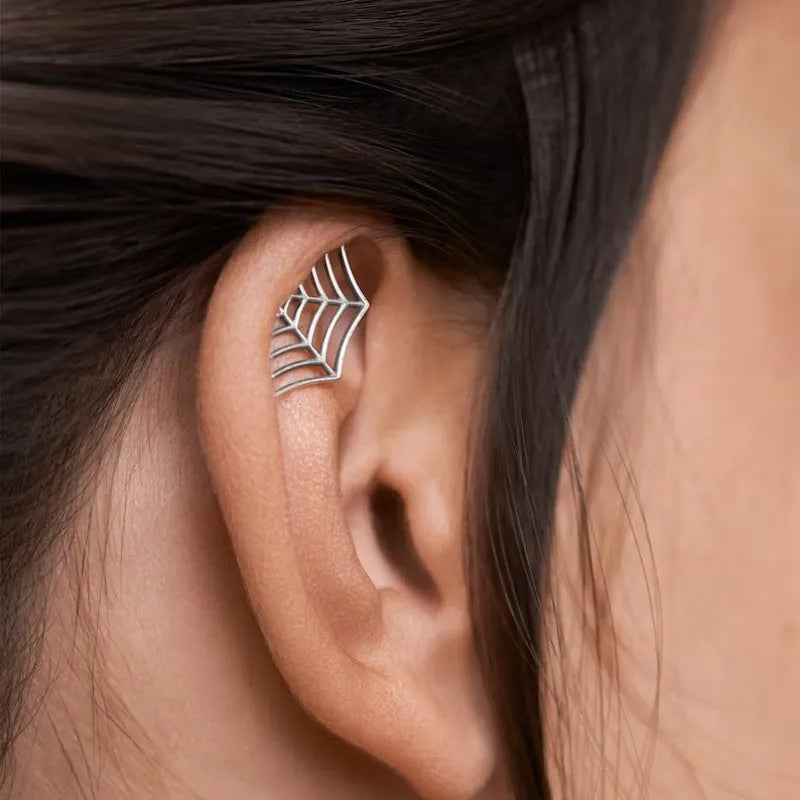 Metal spider web stud earrings with geometric mesh design in gold and silver electroplated finishes