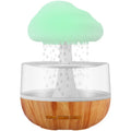 White raining cloud shaped humidifier with flowing water display and colourful LED lights