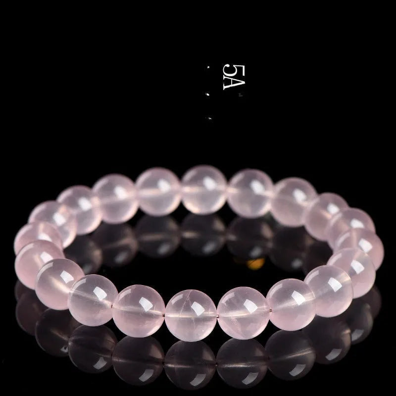 Natural starlight crystal round beads bracelet in pink with polished finish