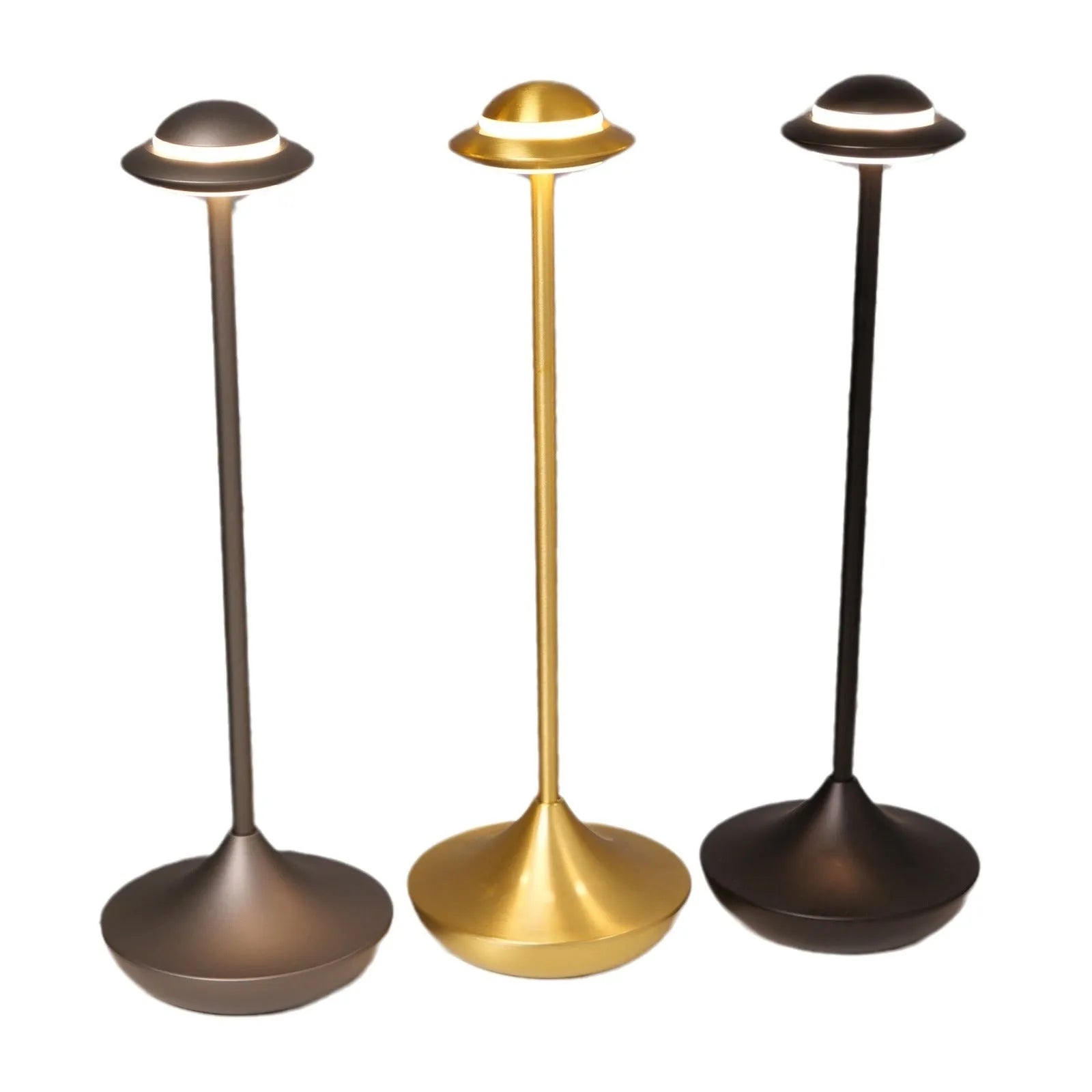 Gold UFO-shaped rechargeable table lamp with touch dimming controls on metallic surface
