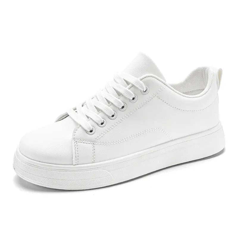 Men's low-top white breathable sneakers with a rubber sole on a plain background
