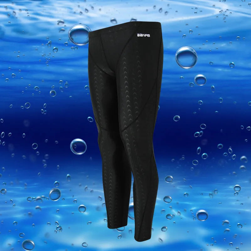 Men's nylon cropped swimming trunks in black with contrast line pattern for athletic swimming and fitness