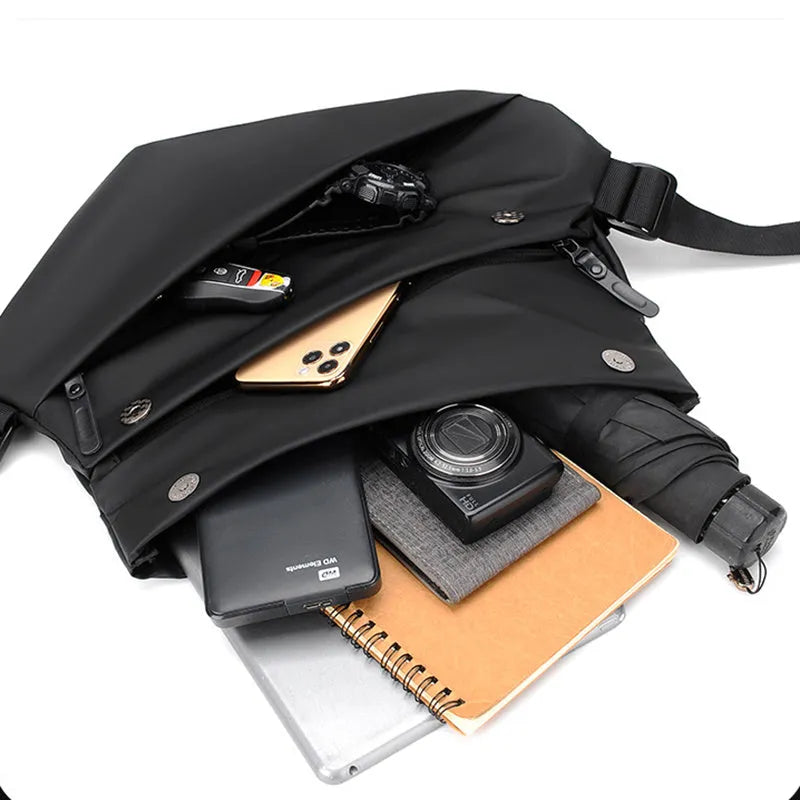 Grey PU leather men's crossbody bag showing internal phone and document compartments