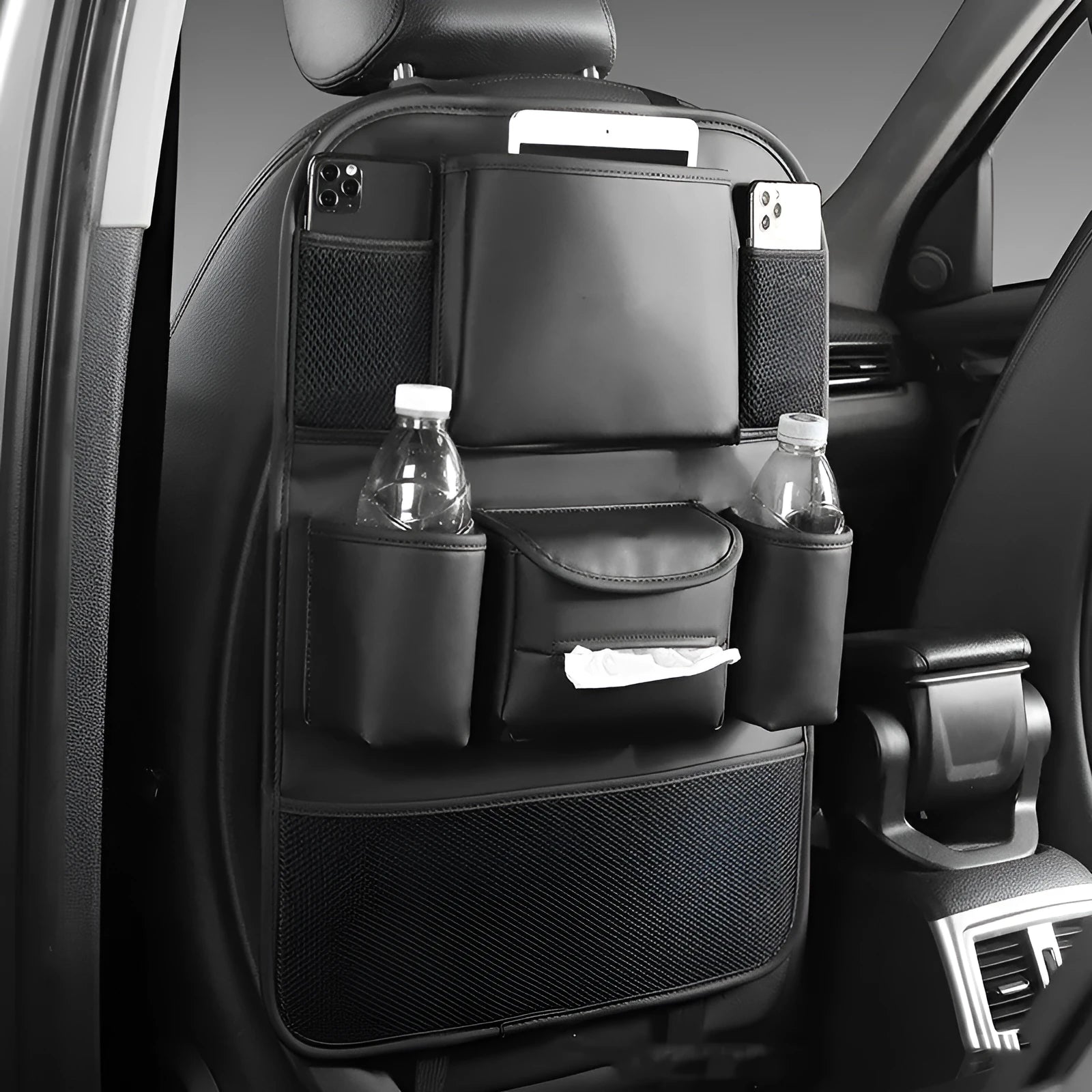 Genuine leather car seat back storage bag in four colour options hanging behind car seat