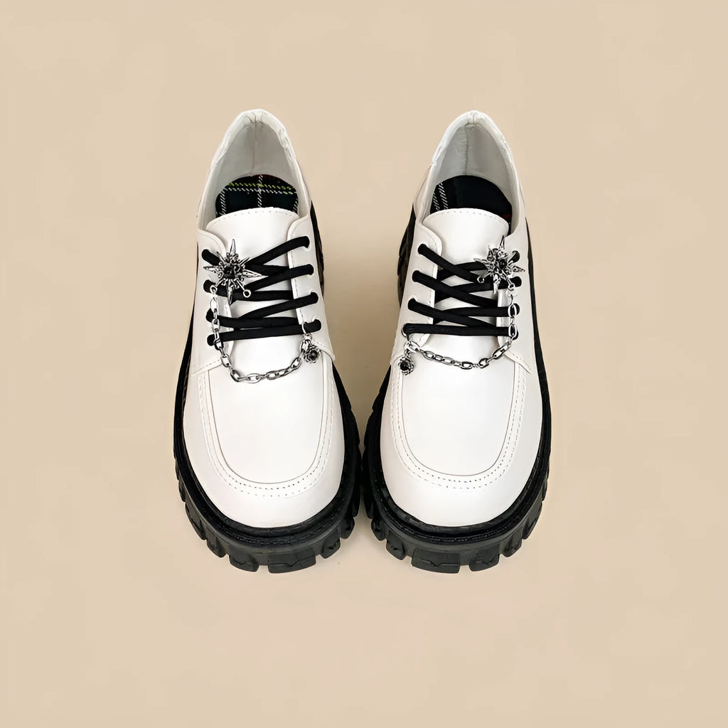 Women's Duke Asterism colour loafers with a round toe and metallic cross strap fastening.