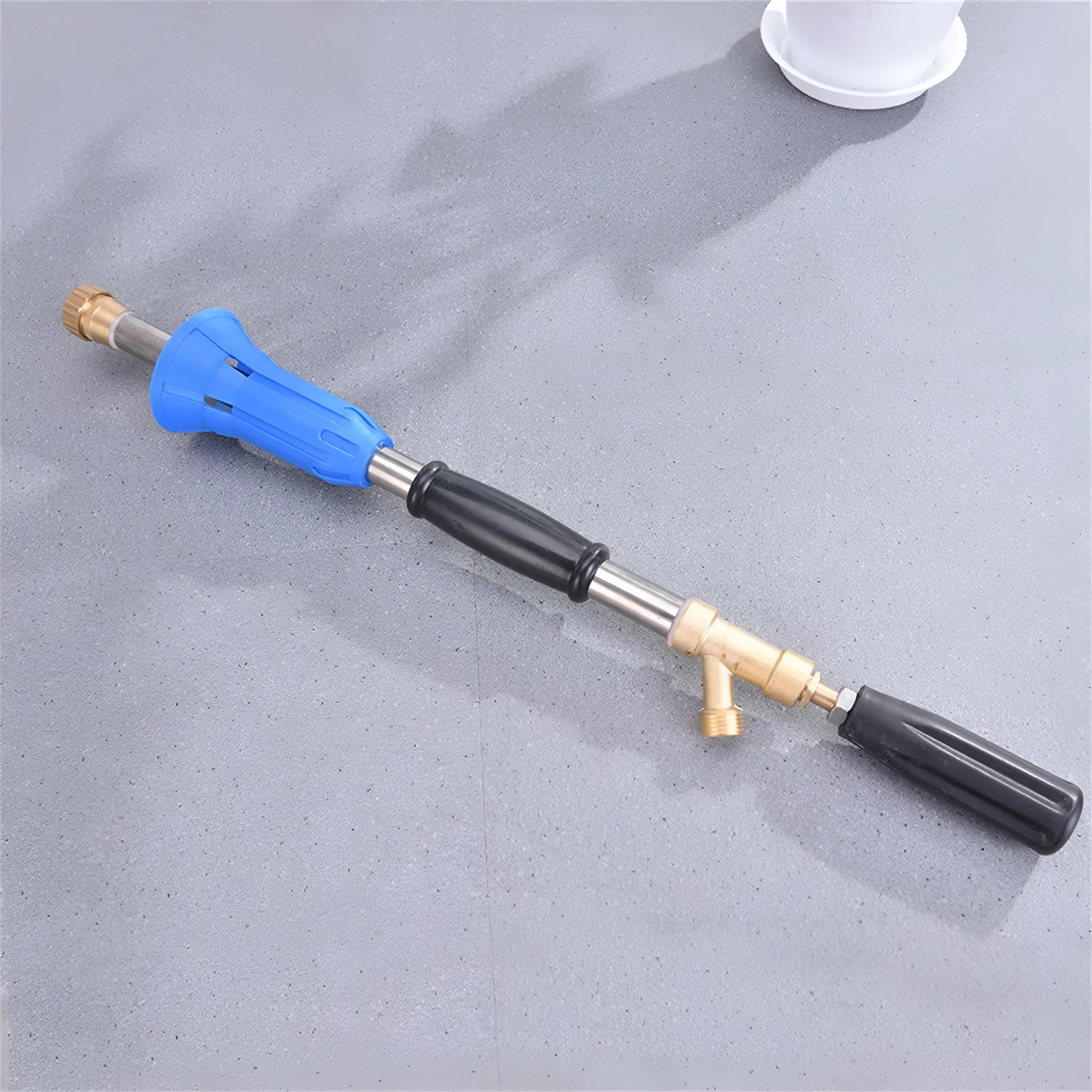 Adjustable high-pressure agricultural spray gun in submachine gun style, made from plastic.