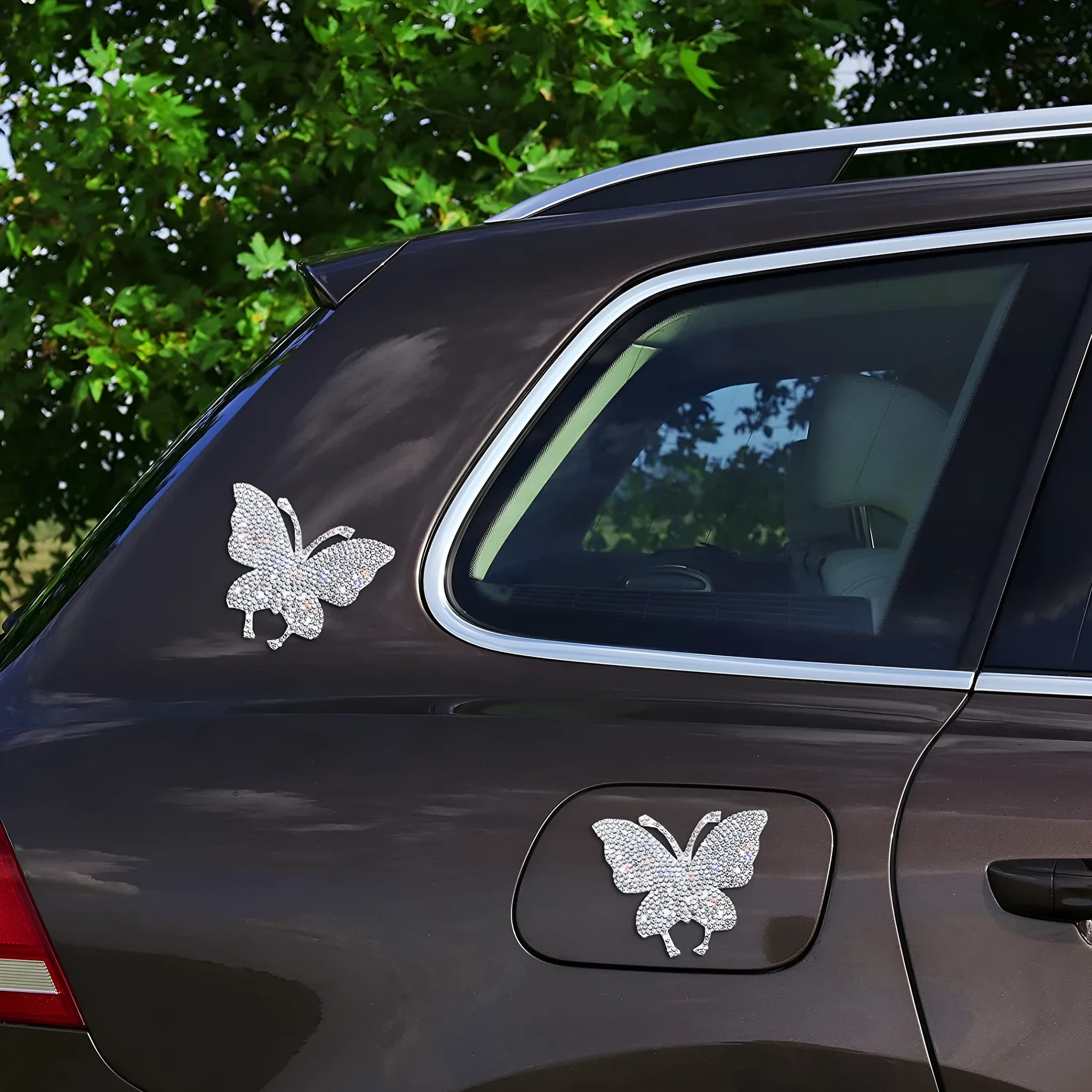 DIY glass car sticker with diamond-encrusted butterfly and bear paw design on white background