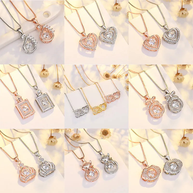 Sterling silver heart pendant necklace with crown detail on adjustable chain