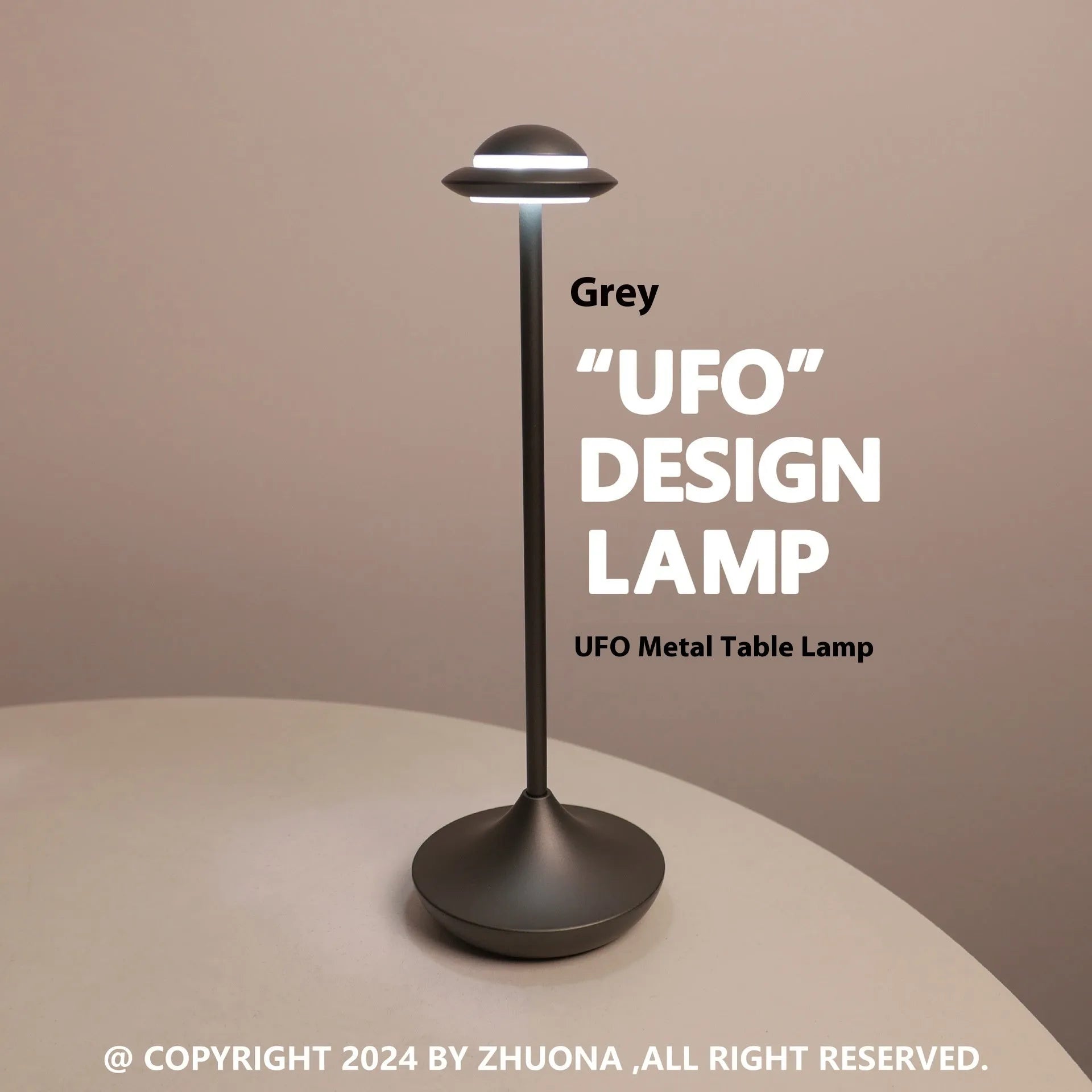 Gold UFO-shaped rechargeable table lamp with touch dimming controls on metallic surface