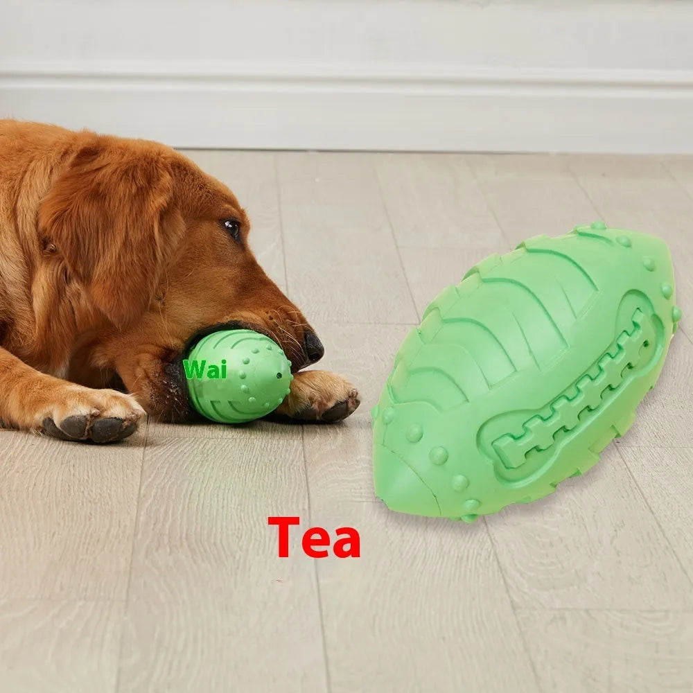 Thickened rubber rugby ball dog toy in light green or sapphire blue for interactive play and teeth cleaning