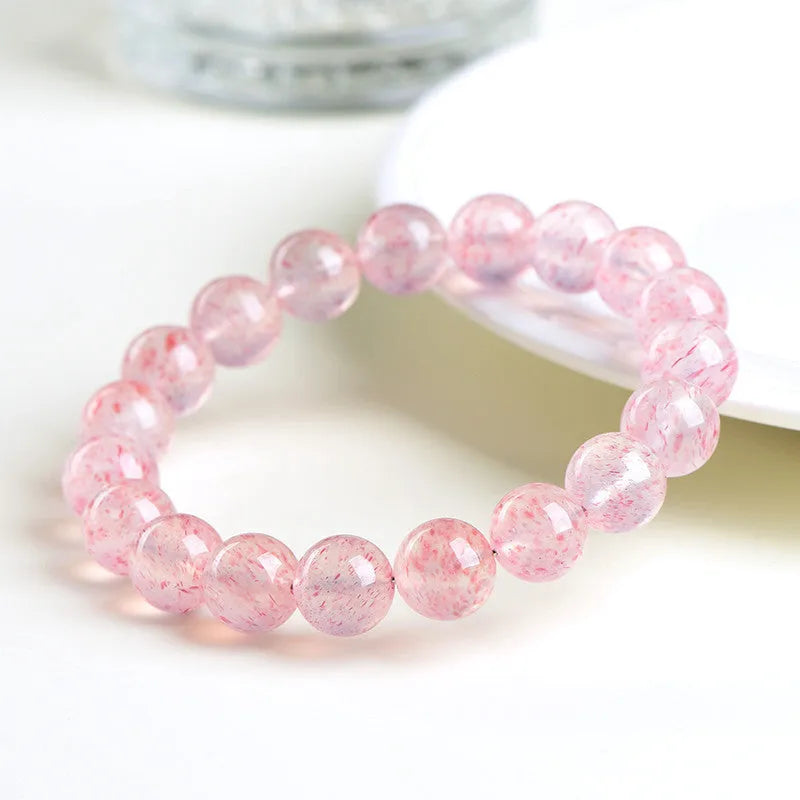 Natural white water strawberry quartz crystal bracelet with geometric cut beads