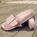 Women's grey blue buckle slippers with a flip-flop design and soft EVA sole on a white background
