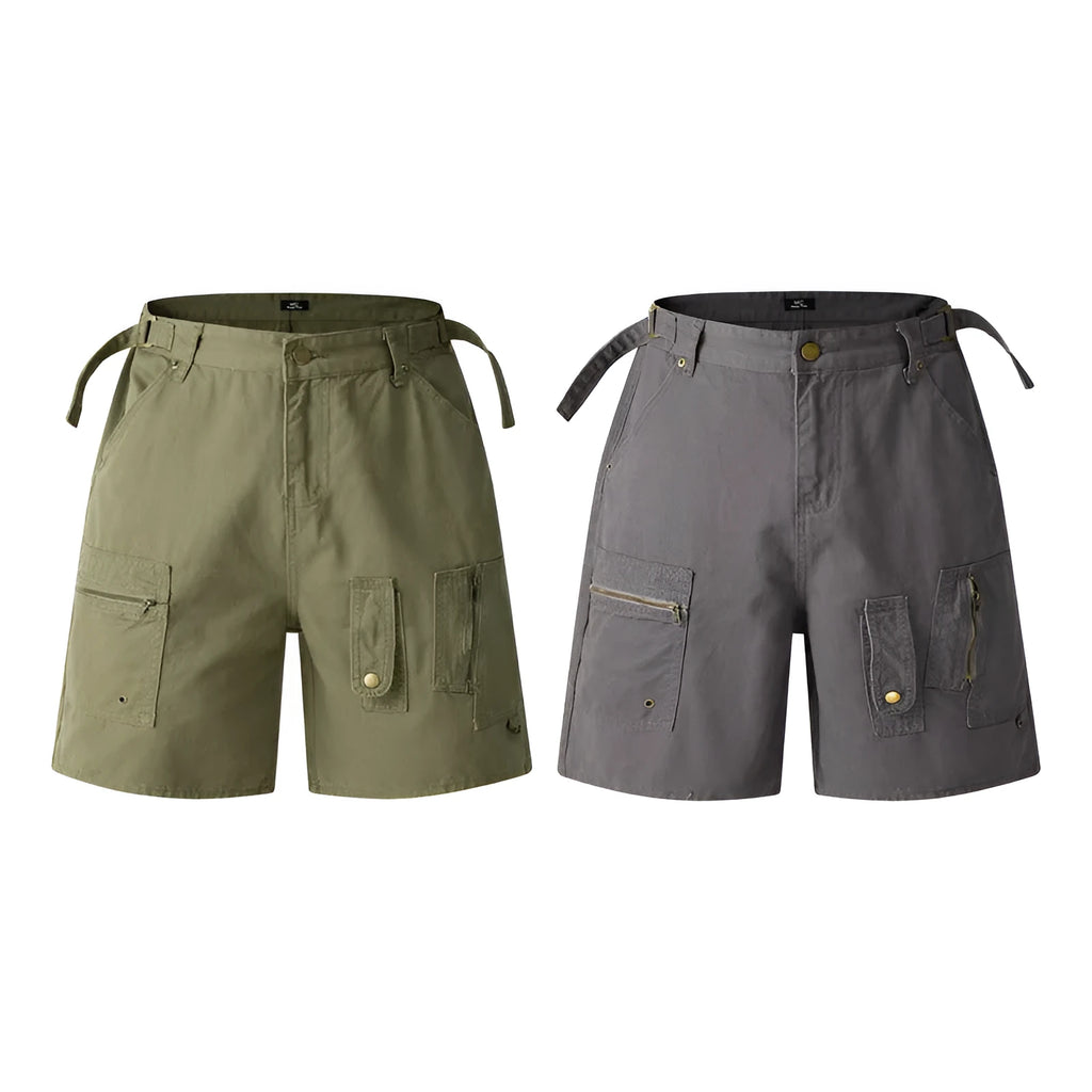 Man wearing grey retro loose-fit washed cotton workwear shorts with a half elastic waistband.