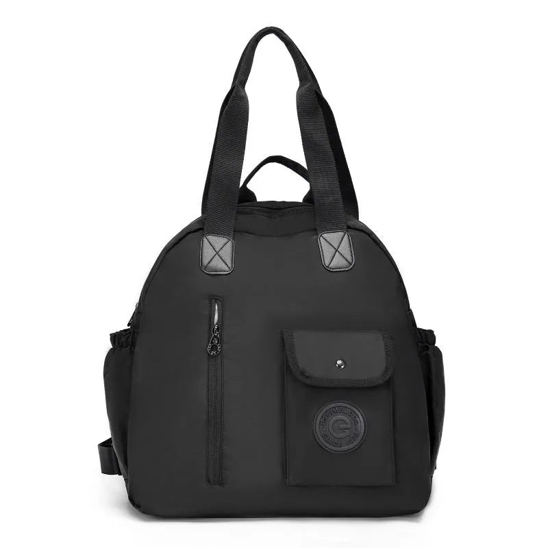 Large lightweight outdoor backpack in black, khaki, or green with rabbit print, showing front sandwich pocket.