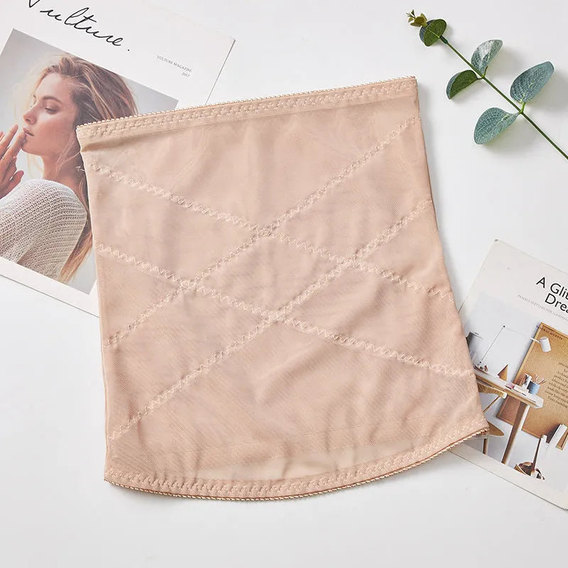 Black mesh belly band with cross-waistband design for body sculpting and postpartum support.