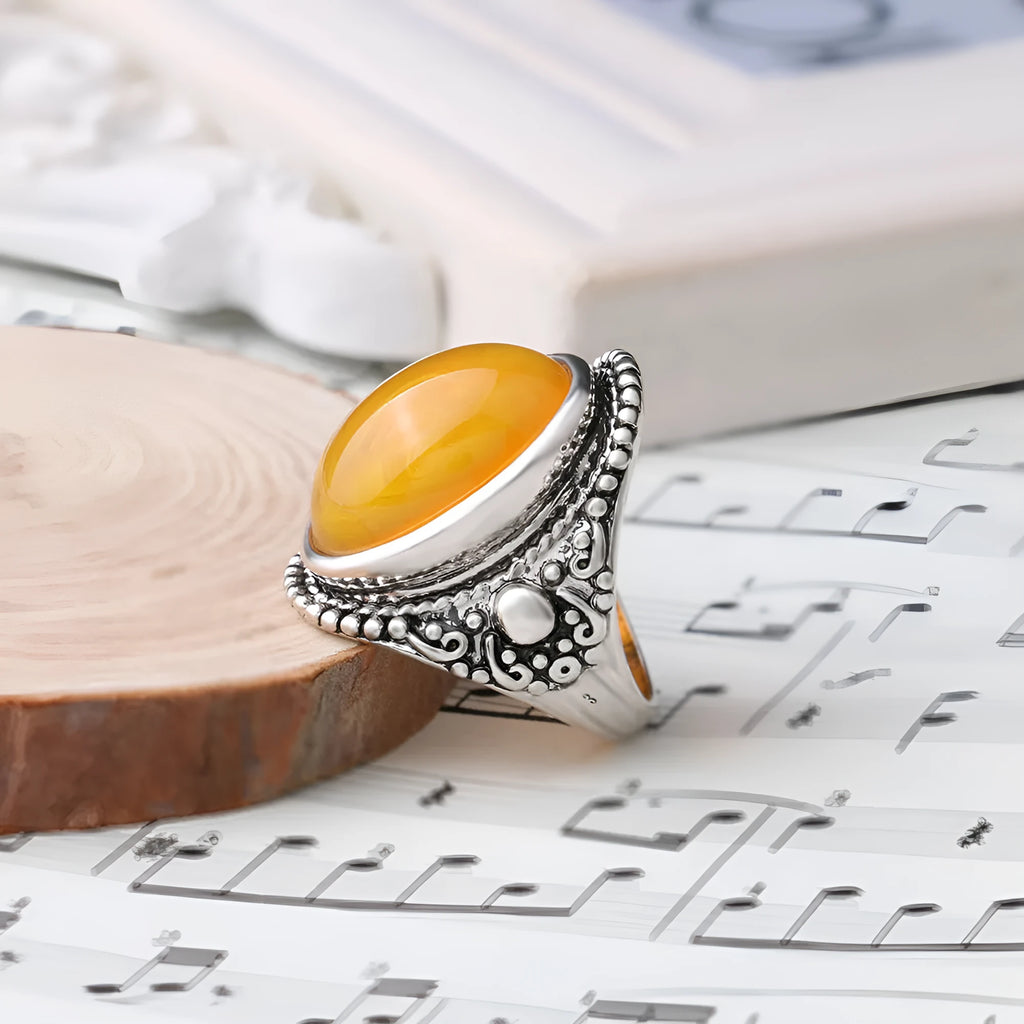 Retro geometric alloy ring with fluorescent beeswax centre and antique silver electroplated finish