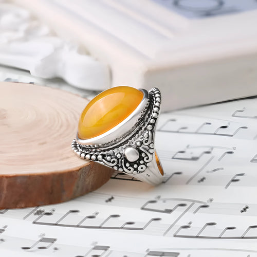 Retro geometric alloy ring with fluorescent beeswax centre and antique silver electroplated finish