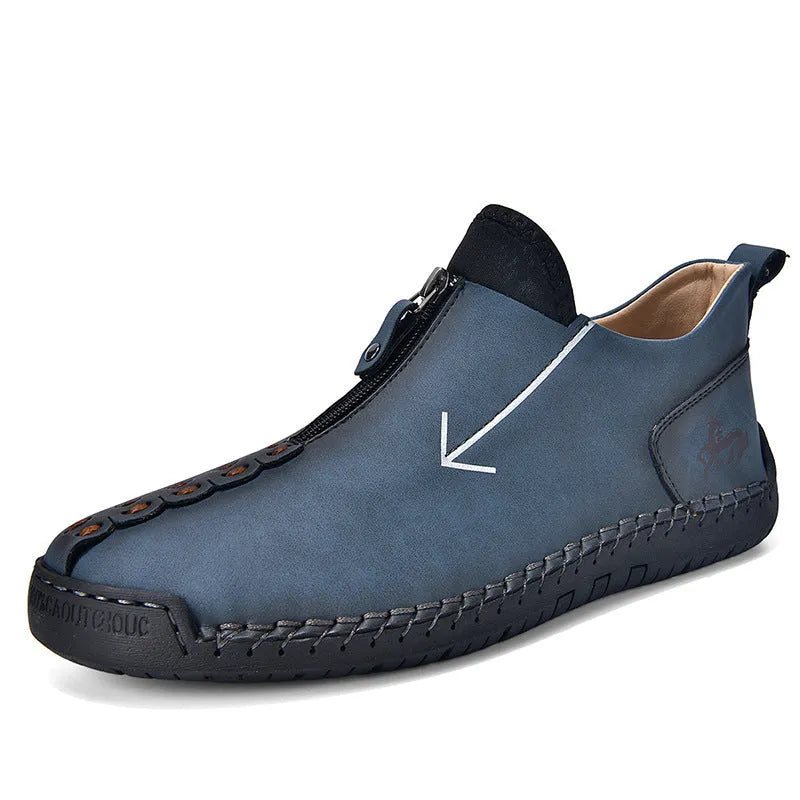 Men's black leather zip-up boots with hand-stitched detailing and round toe