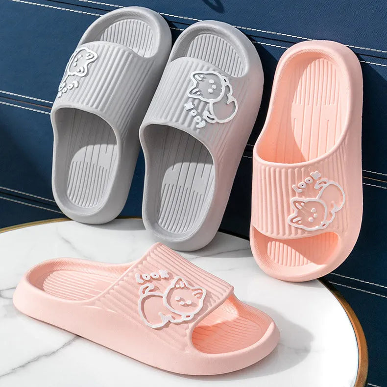 Green EVA cat flip-flop slippers with a thick platform sole on a white background.