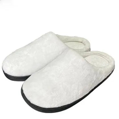 A pair of printed cotton flannel slippers with a raised heel, shown on a colour background.