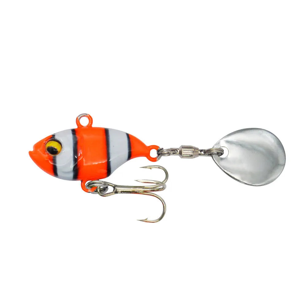 Metal sea fishing lure with rotating sequin in gold colour option