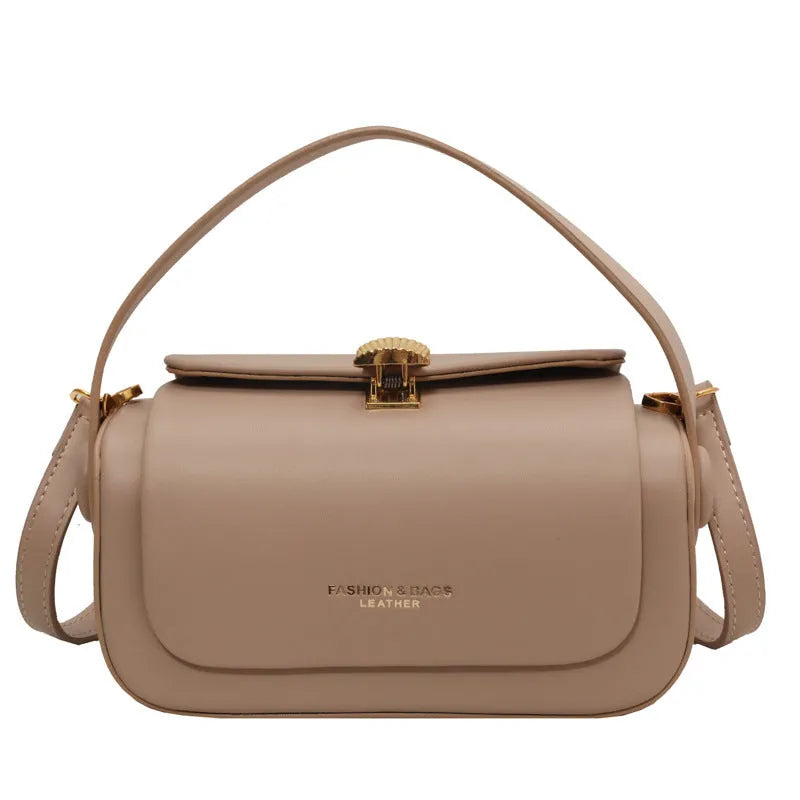 Personalised women's shoulder messenger bag in PU leather with letter detailing, shown in beige colour.