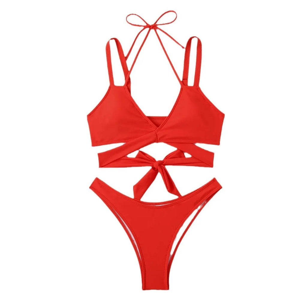 Women's solid colour bikini swimsuit on a hanger, showing adjustable straps and briefs style.