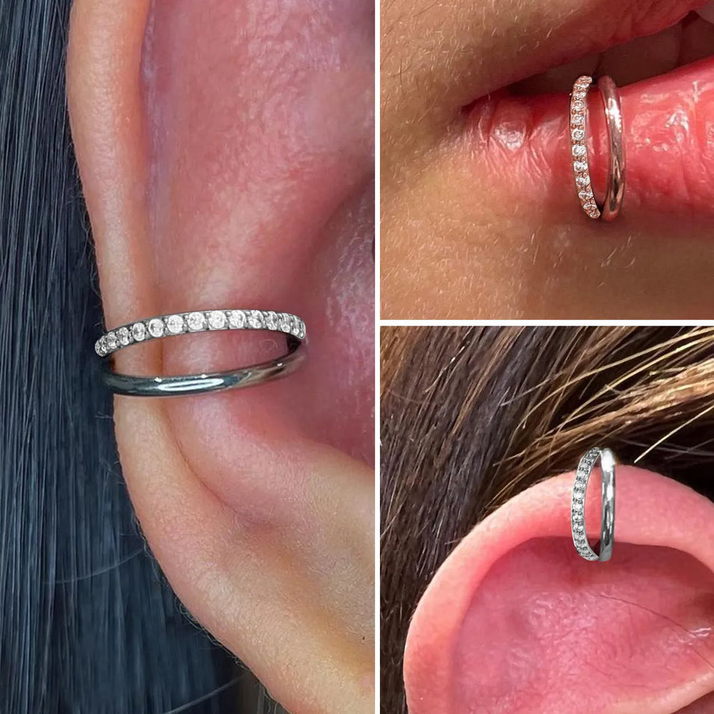 Titanium alloy fork nose ring in silver colour on black background