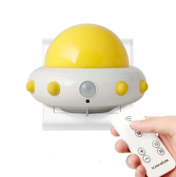 Blue remote control UFO shaped bedside night light with dimensions 105mm by 76mm by 58mm