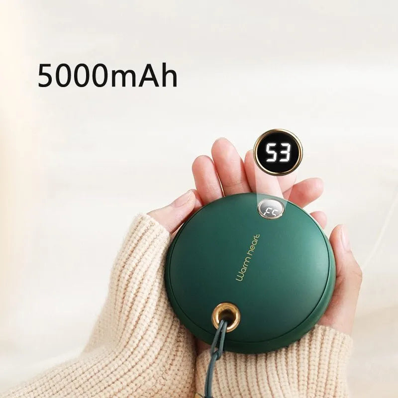 Green hand warmer power bank with digital display showing battery percentage and temperature settings