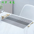 PVC non-slip dish mat in gradient bamboo design protecting kitchen worktop with dishes