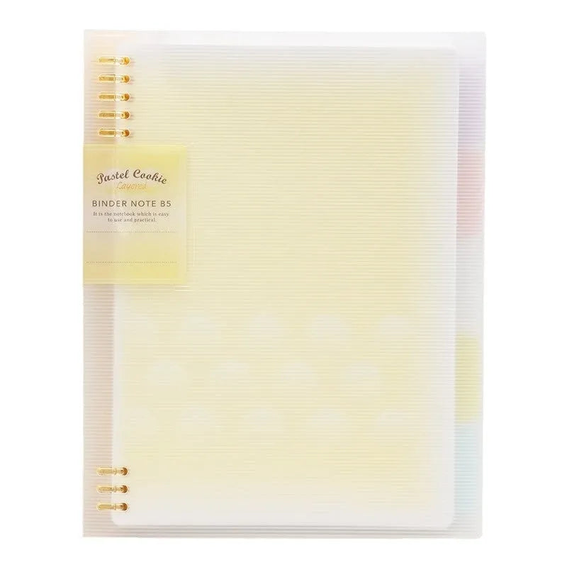 Refillable loose-leaf spiral notebook with PP cover open, showing raw wood pulp paper in grid ruling.