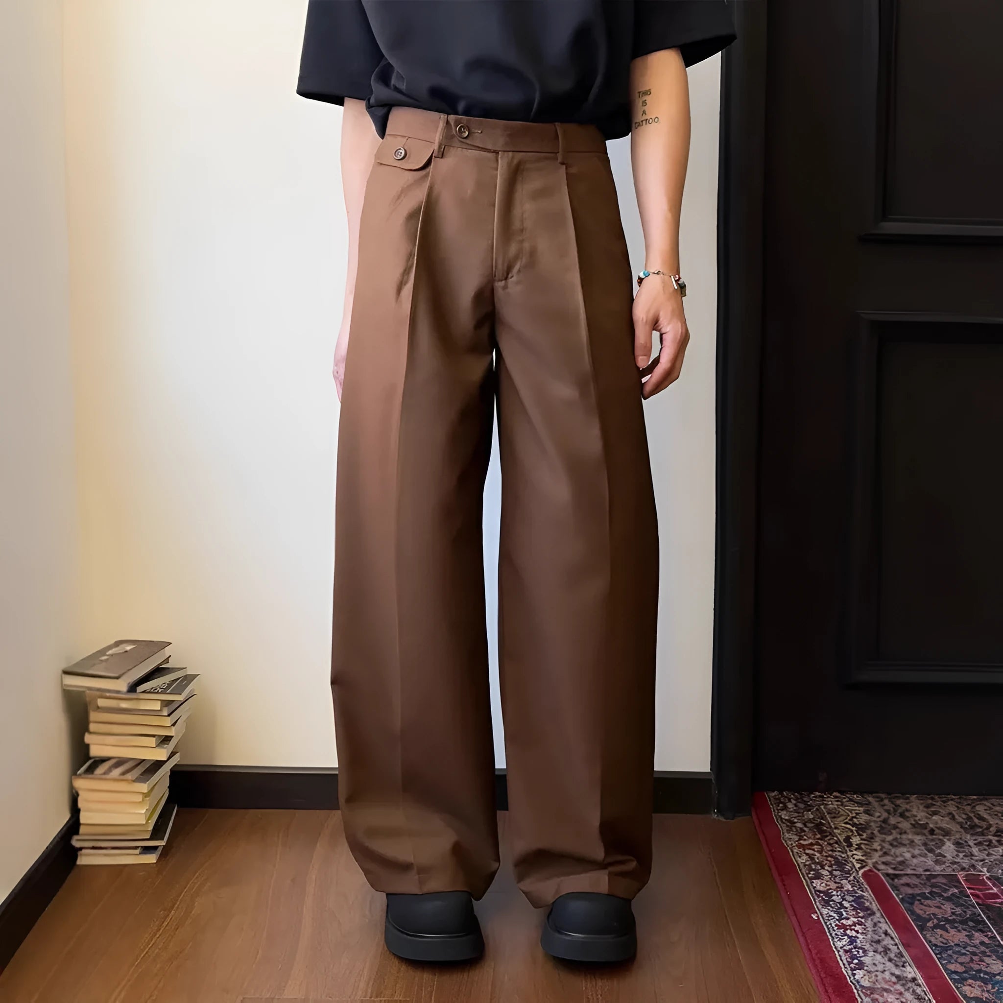 Men's straight-leg wide casual suit pants in brown solid colour, showing loose drape fit.