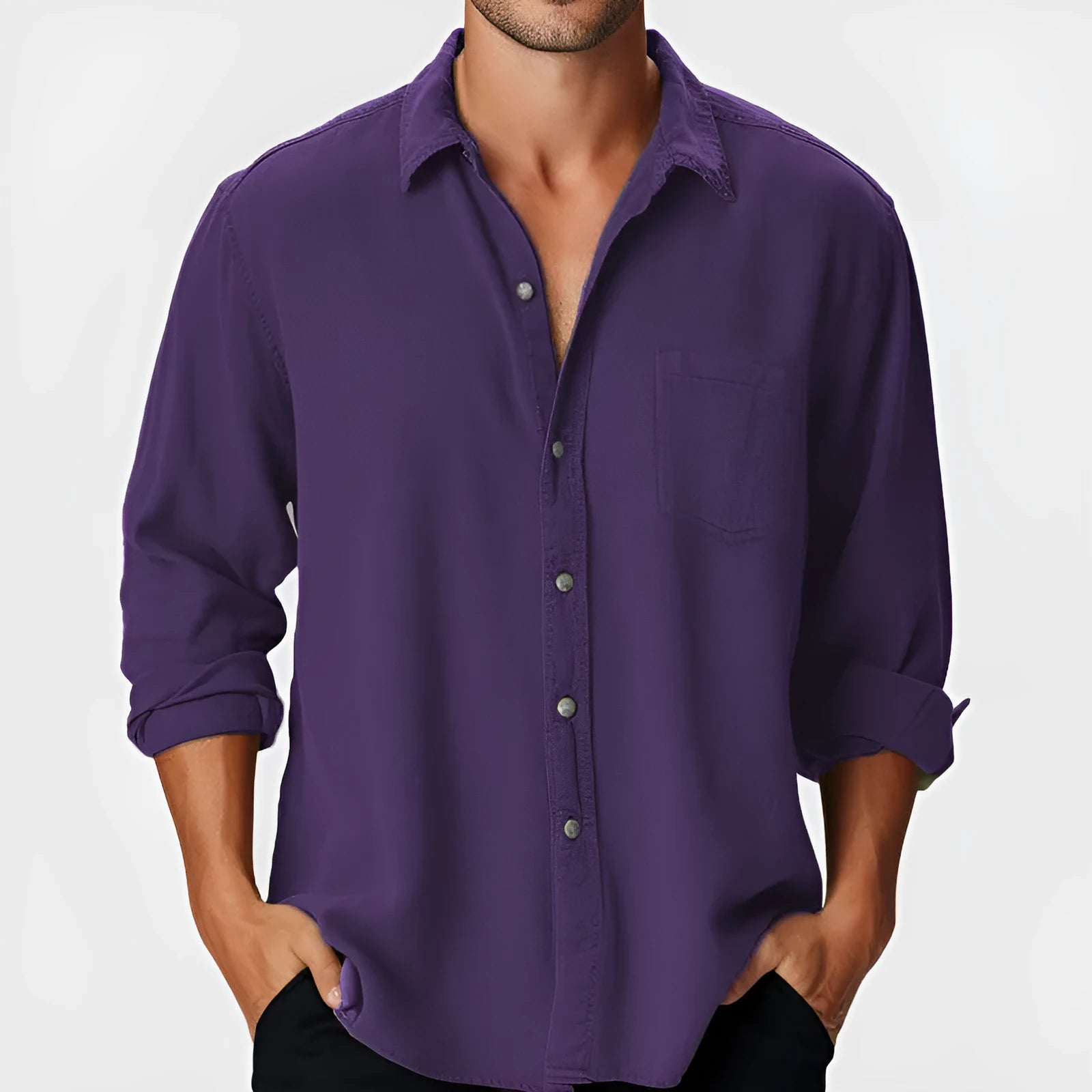 Man wearing a loose-fit long sleeve casual shirt with a stand collar, suitable for beach holidays.