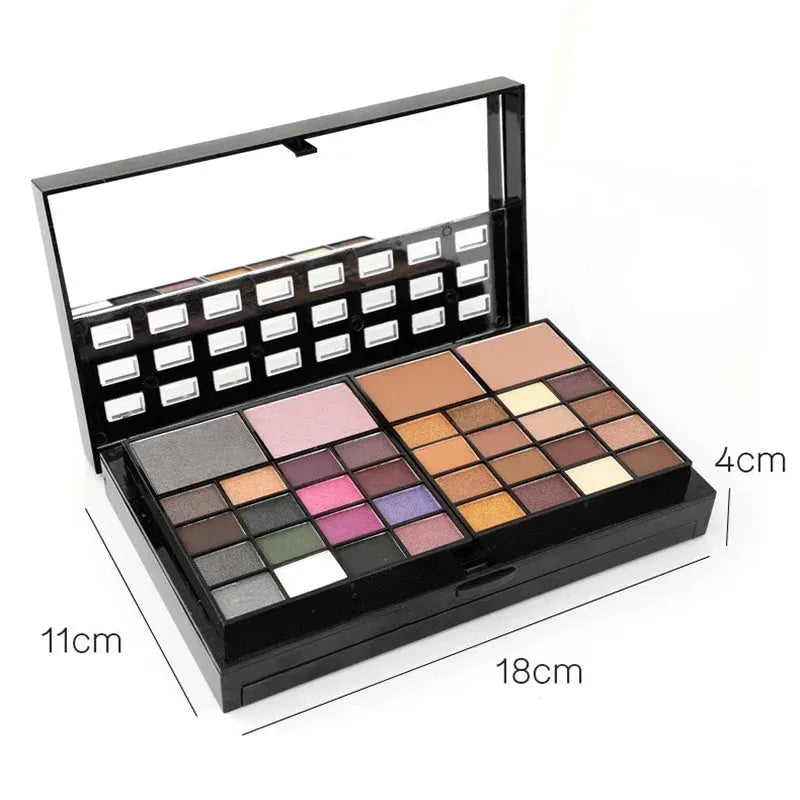 74 colour makeup palette open showing eyeshadows, lip glosses, concealers, blushes, and contour powders with included brushes
