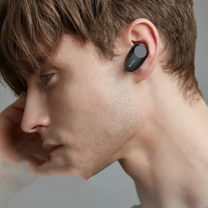 Black wireless Bluetooth headset with twin earpieces and charging case featuring ANC and voice control