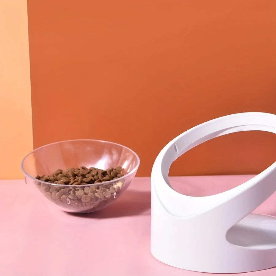White clear plastic tilted ergonomic cat food bowl for dry and wet food.