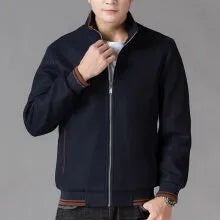 Men's grey polyester fleece autumn jacket with side pockets, shown in a sports-style casual fit.