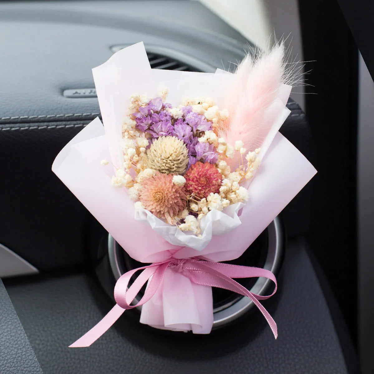 Handmade dried flower car vent ornament with interchangeable scented discs in multiple colour options
