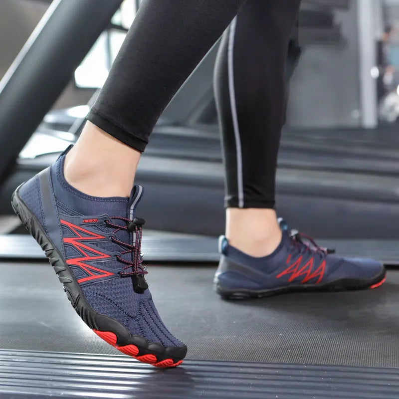 Lightweight indoor fitness training sneakers with low-top design and striped pattern.