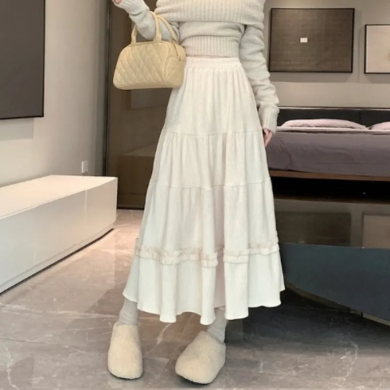 Corduroy A-line midi skirt with elastic waistband in milky white, black or brown colours