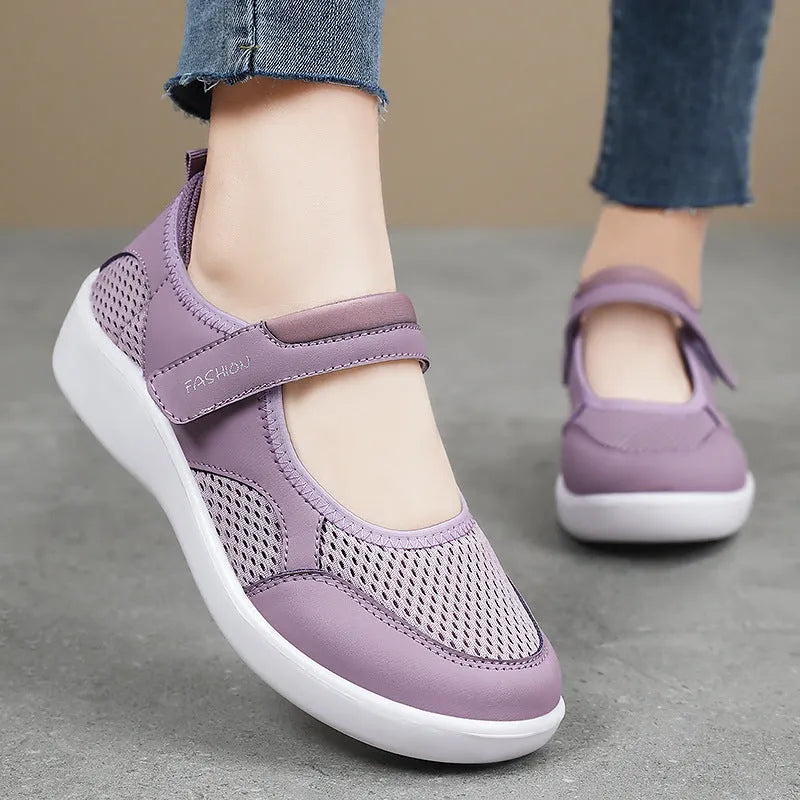 Women's grey mesh casual shoes with velcro fastening and round toe design