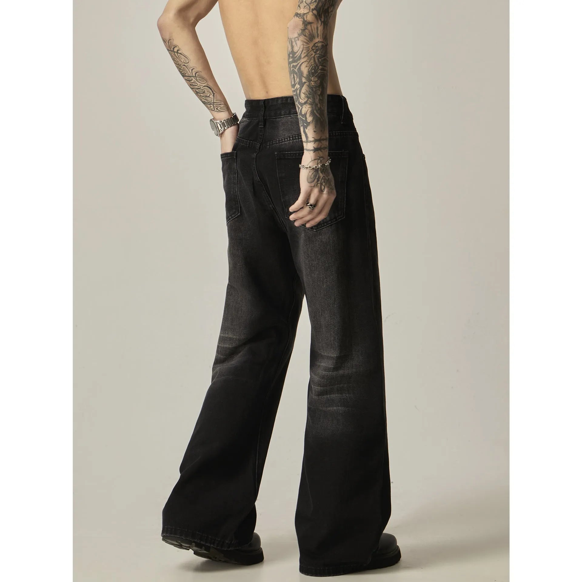 American retro black loose straight jeans with zipper fly on mannequin showing loose fit