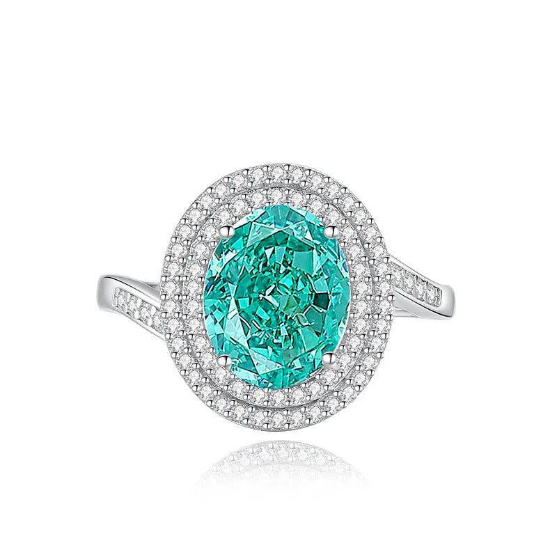 S925 silver emerald ring for women with inlaid high carbon diamonds in a geometric design on a white background.