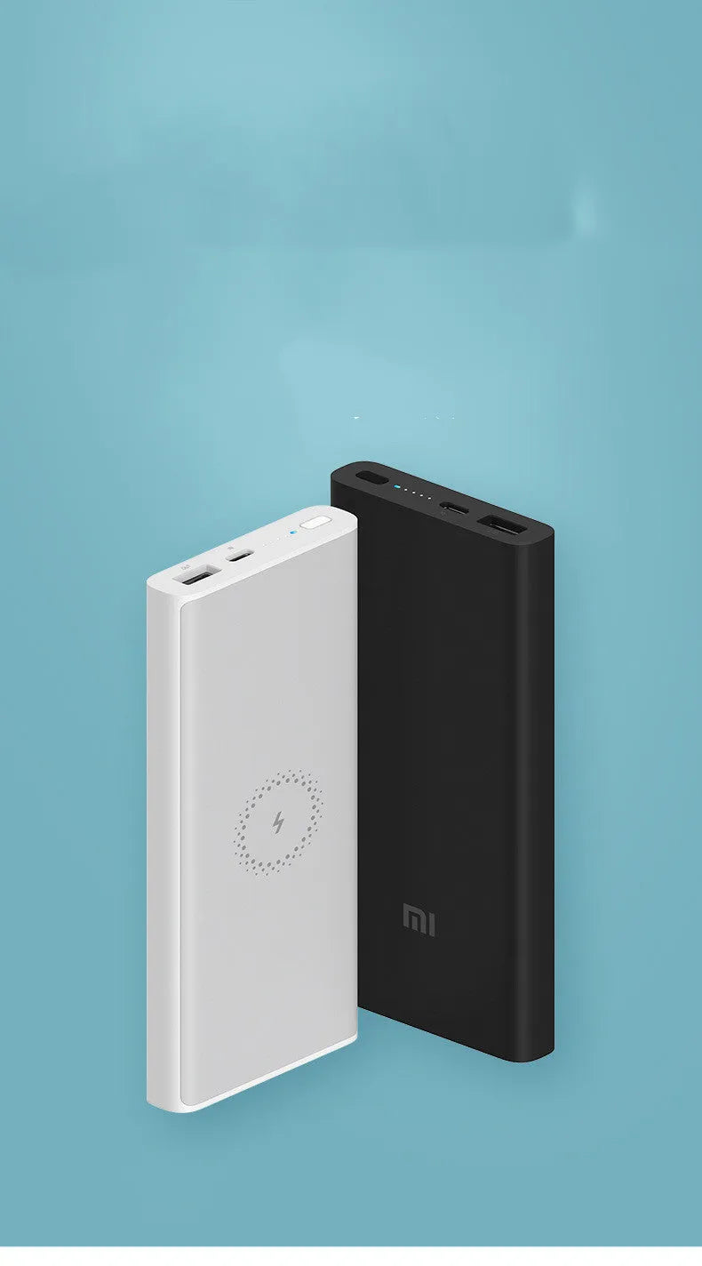 White 10000mAh power bank with USB port and wireless charging surface