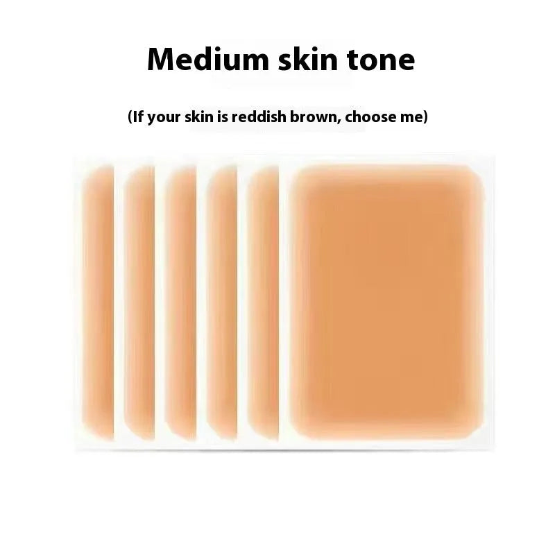 Pack of adhesive tattoo cover patches in various skin tone colours on a white background.