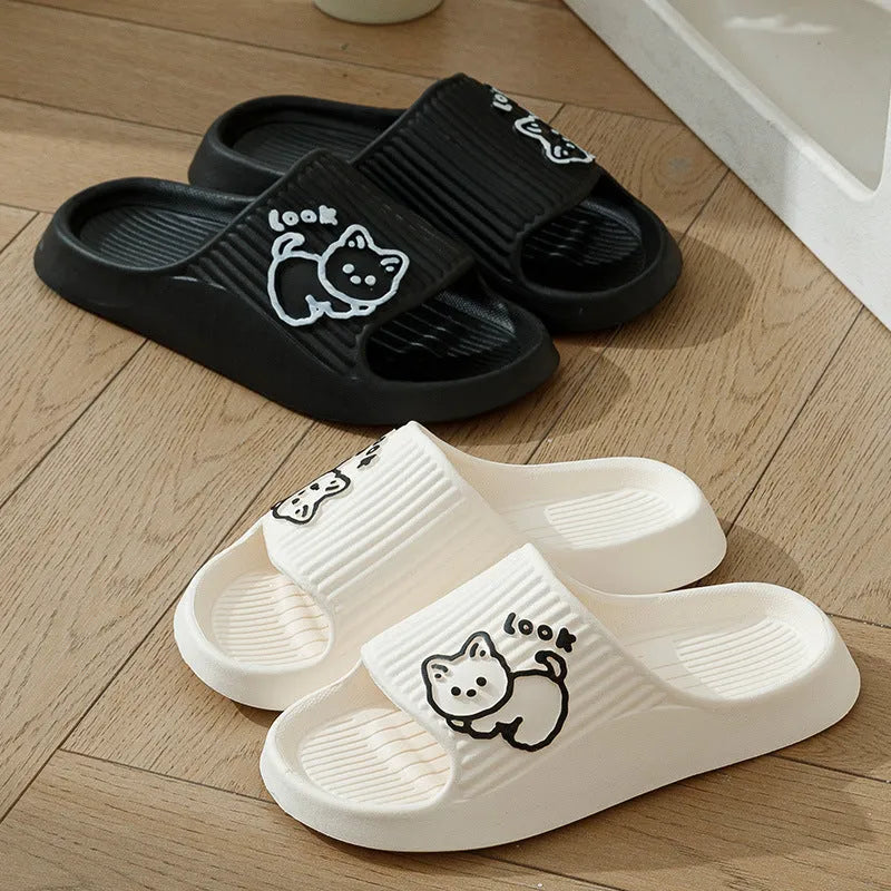 Green EVA cat flip-flop slippers with a thick platform sole on a white background.