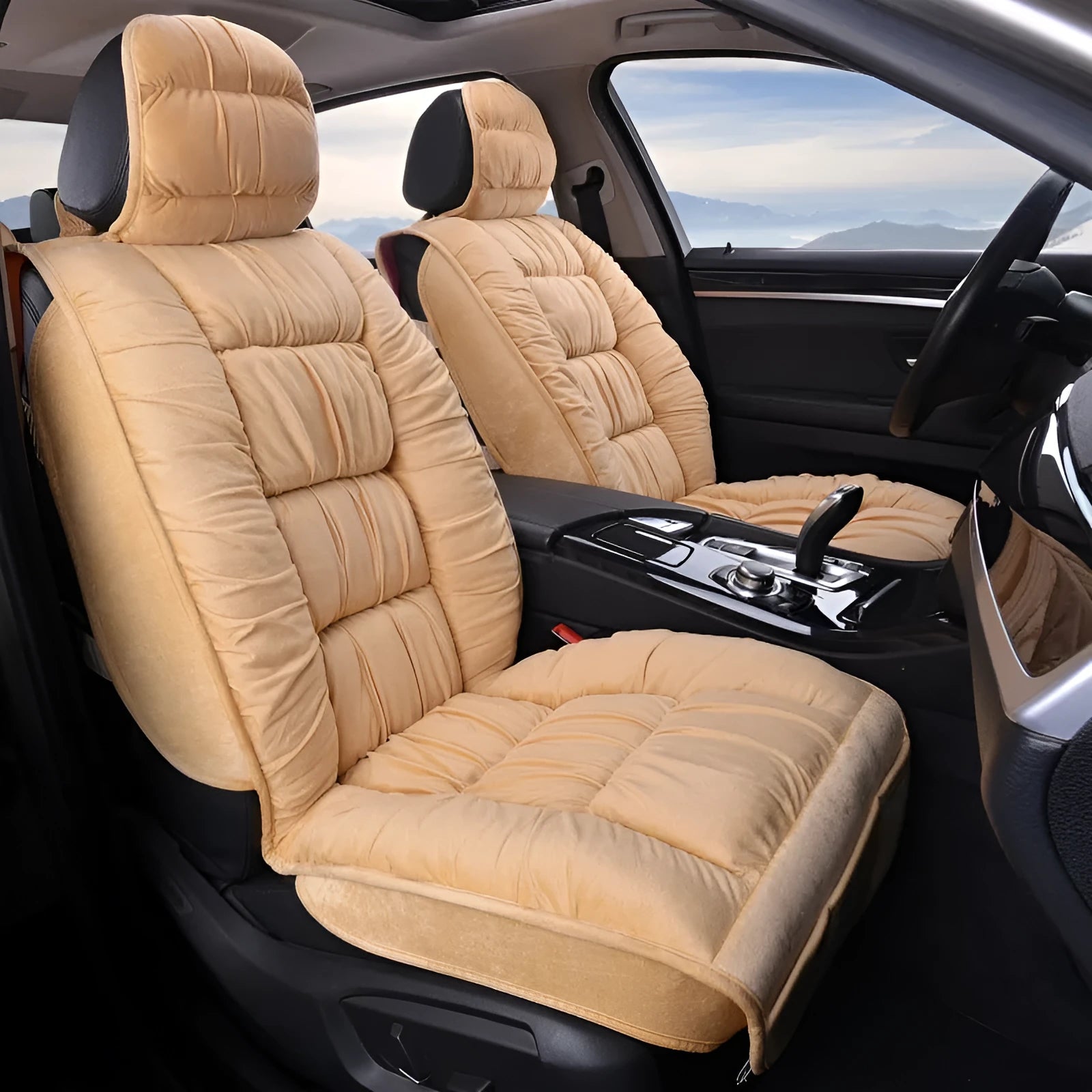 Short plush car seat cushion in charcoal grey on vehicle seat