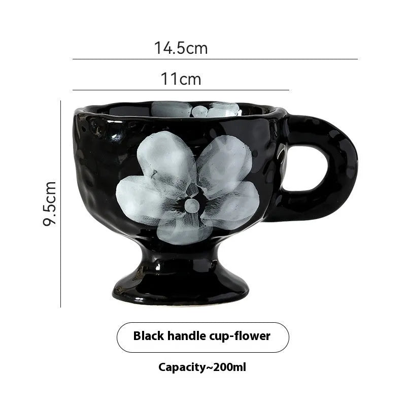 Handmade ceramic mug with irregular shape in solid colour