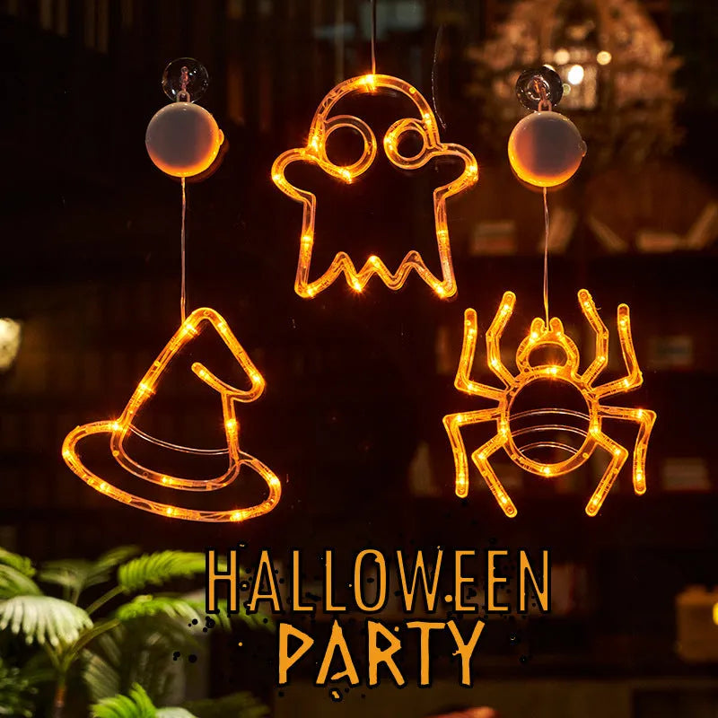 Seven Halloween LED lights with suction cups featuring spider, pumpkin and ghost designs for window decoration